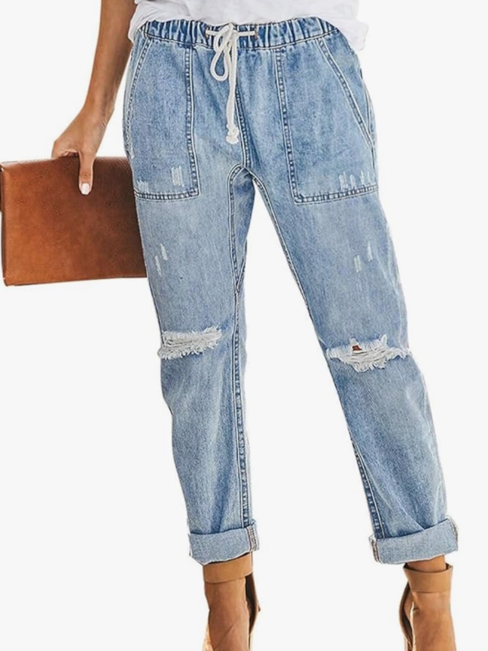 Casual light blue capris with a relaxed drawstring waist for easy wear. Distress